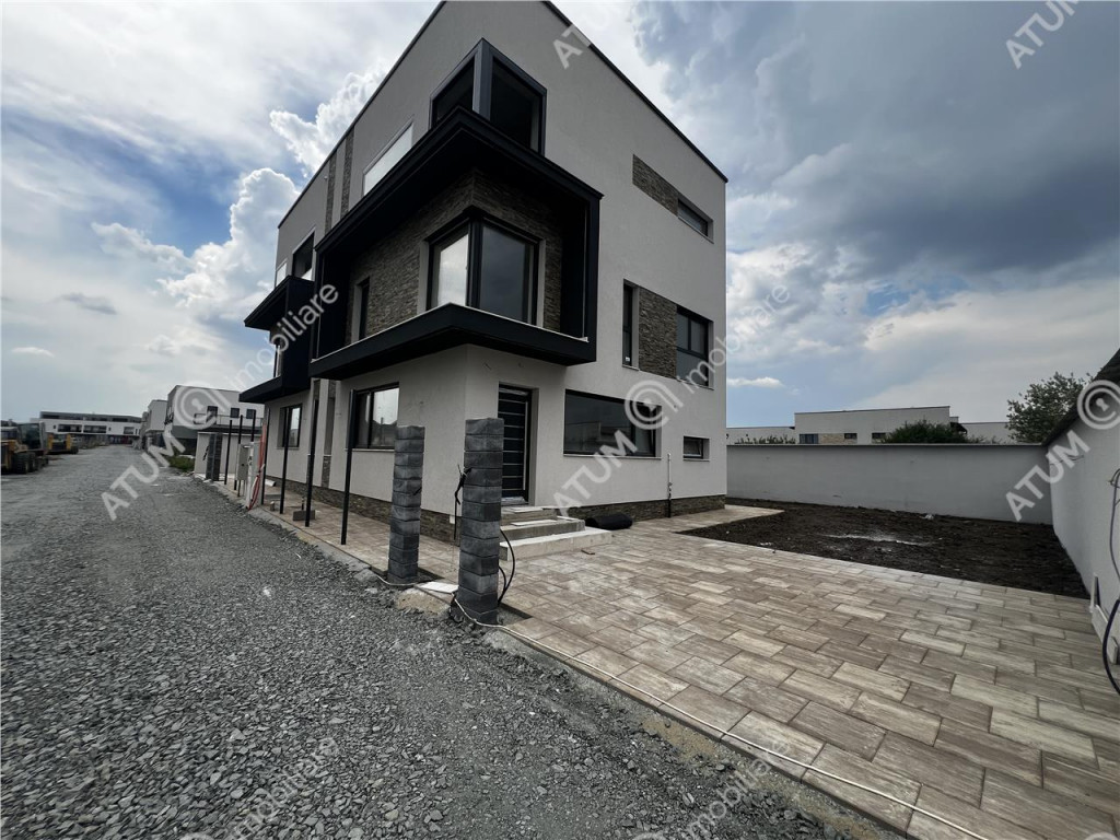 Casa intabulata cu 4 camere 3 bai si teren de 214 mp zona Tr