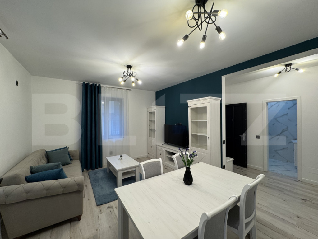 Apartament 3 camere, 2 bai, parcare, zona UMF