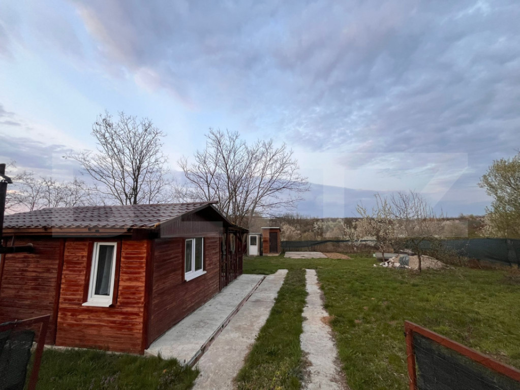 Teren– 400 mp, căbănuță + utilități, acces asfalt