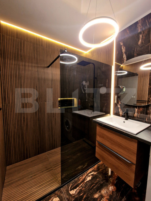 Apartament ultrafinisat 3 camere, 51 mp, terasa 27 mp, garaj