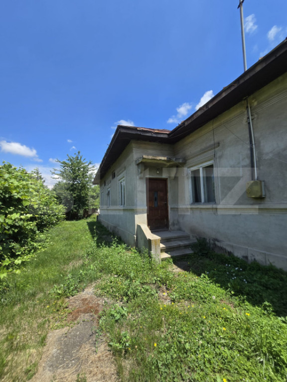 Casă 65 mp, teren de 1.500 mp, zona Titu