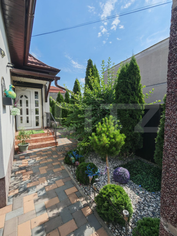 Casă complet renovată, 104 mp – acces din două străzi,