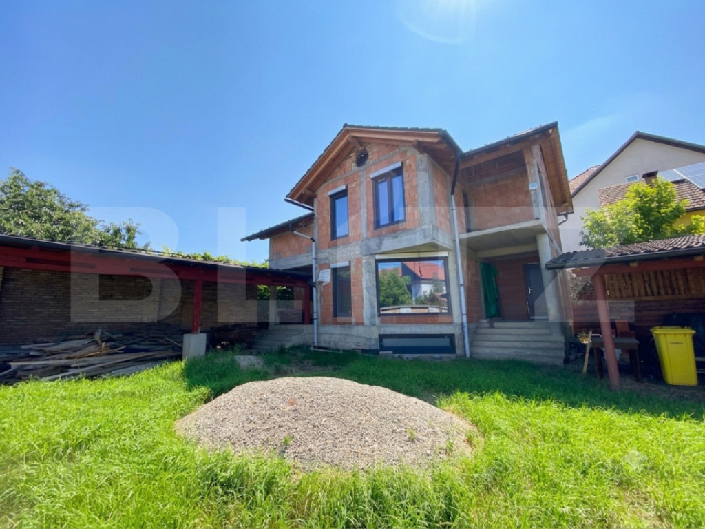 Casă D+P+E la roșu, 196 mp, garaj, teren 410 mp – zona e