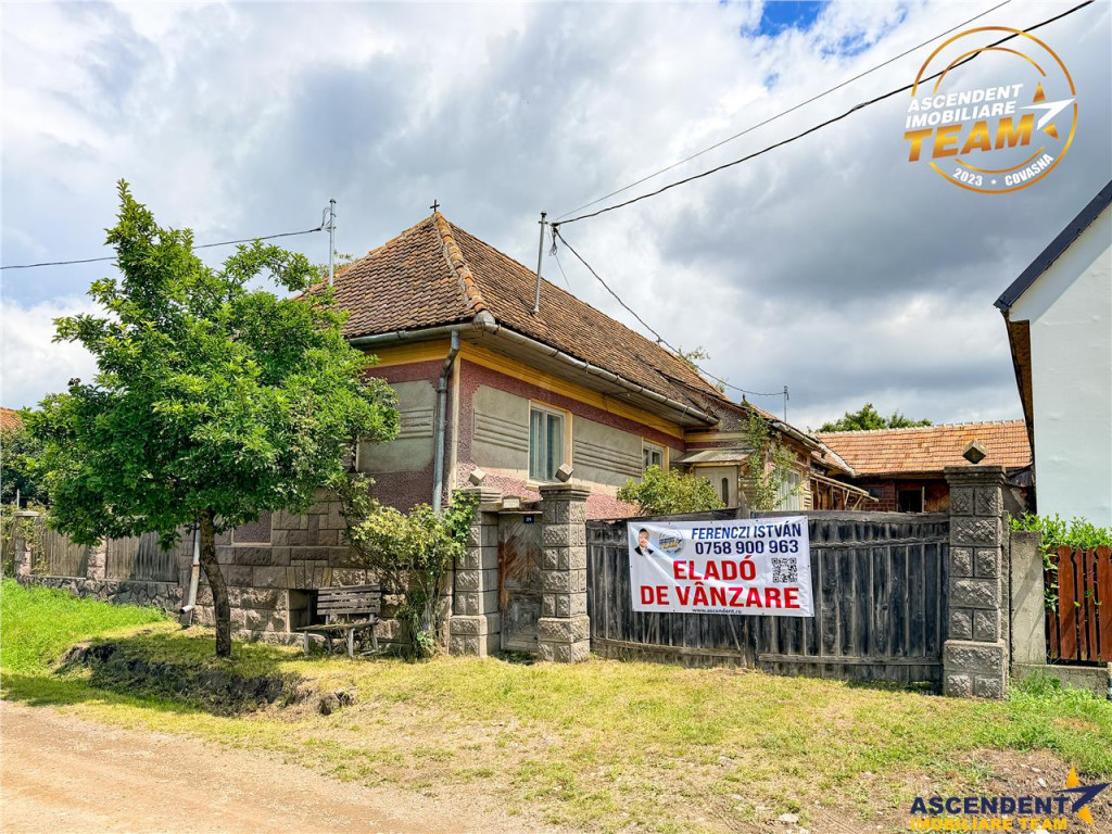 Casa din caramida cu 1.087 mp teren, pozitie centrala, utili