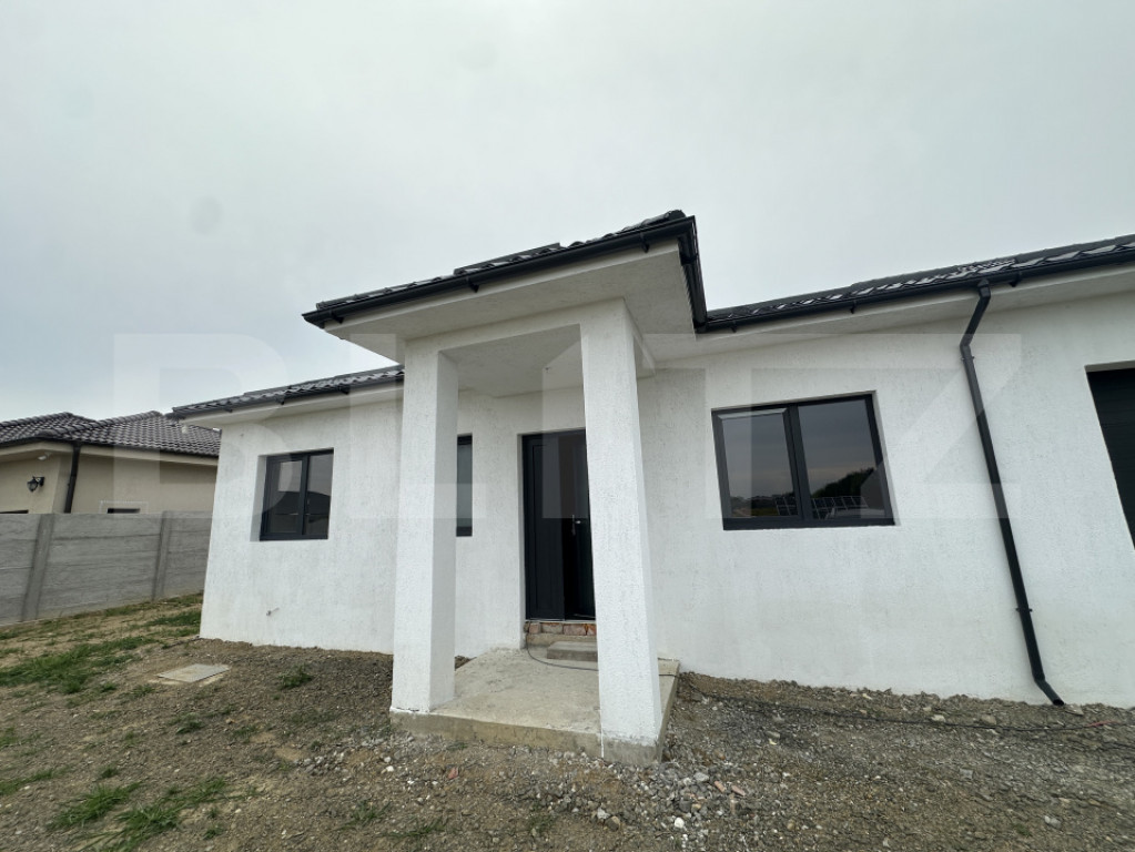Casă cu garaj, 130 mp, teren 619 mp - zona Cionchesti