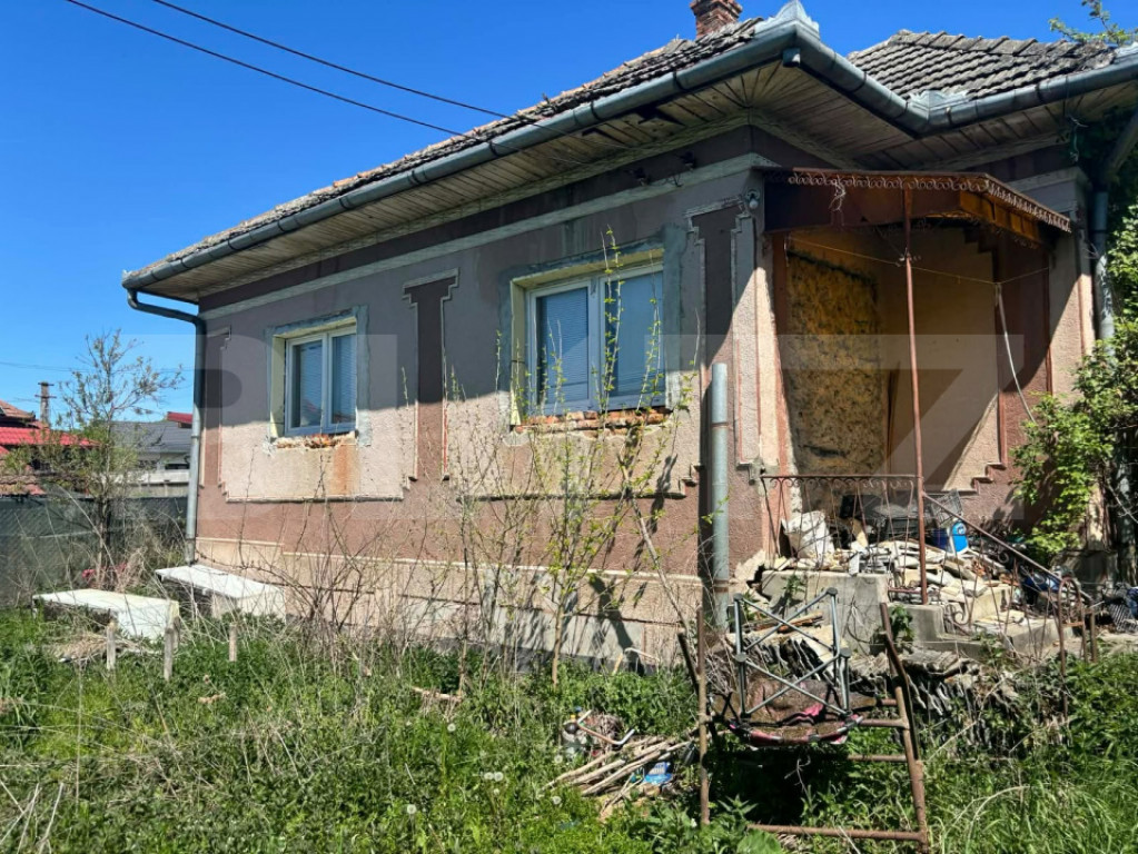 Casa de vanzare, cu 12 ari de teren, in Balan