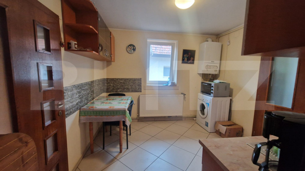 Casa cu teren 935 m , doua corpuri de case, Sacele -zona bun