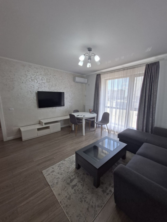 Garsonieră tip studio, mobilată/utilată, loc de parcare p