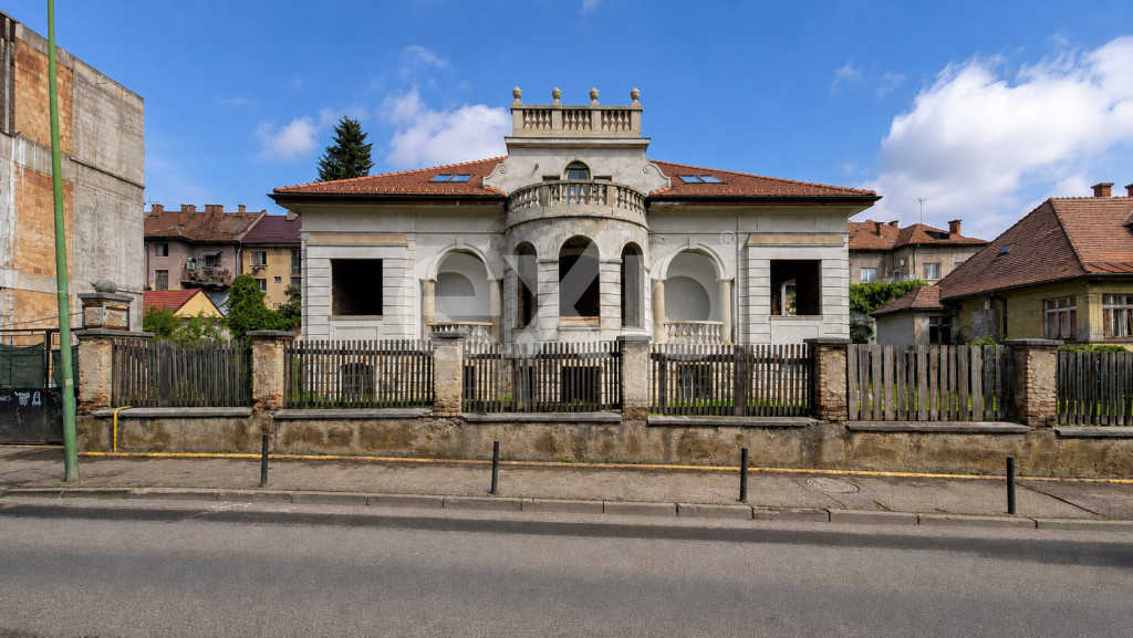 Casă cu arhitectură deosebită, 842 mp și teren de 1.048