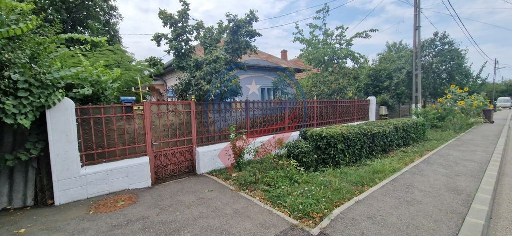 Casă parter cu teren generos de 595 mp, în Șimnicul de...