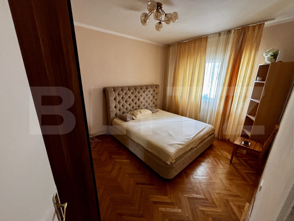 Apartament spațios cu 4 camere, 3 dormitoare și parcar