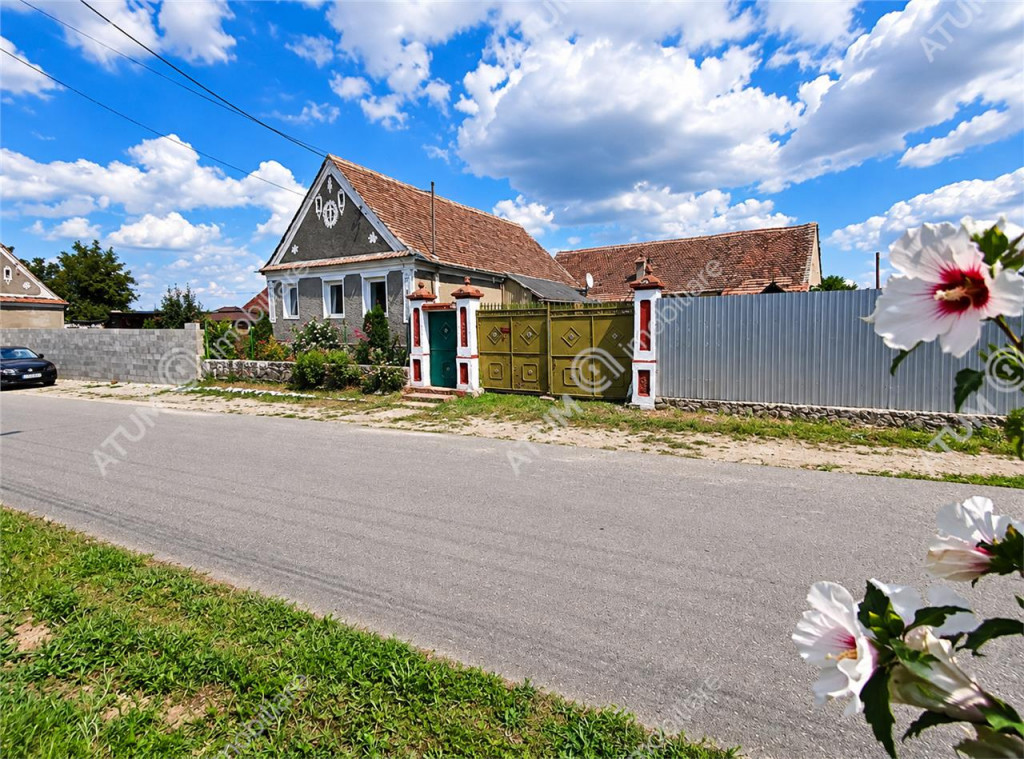 Casa cu 4 camere si 1650 mp teren la doar 30 km distanta de