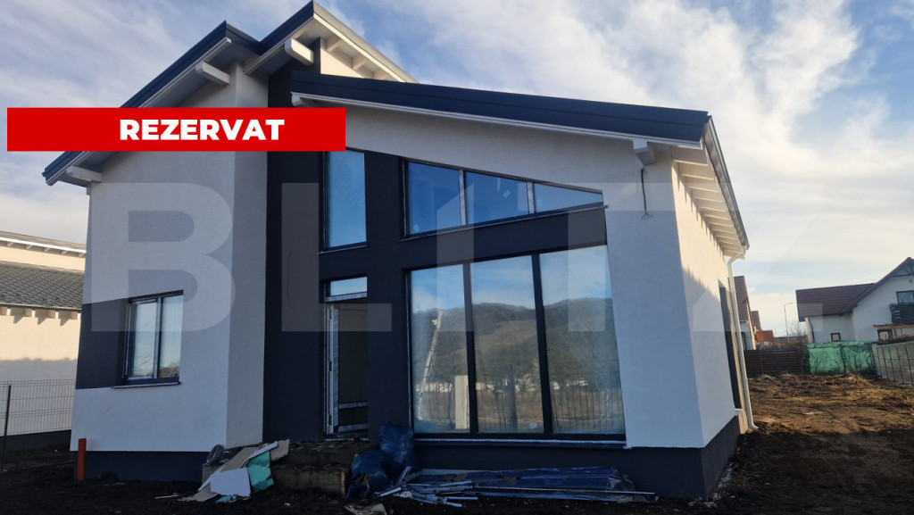 Casa Harman individuala , 712 mp teren , moderna, intabulata