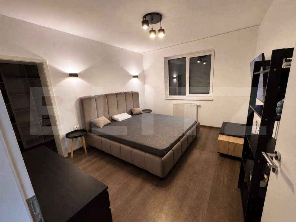 Apartament modern , 2.5 camere, etaj 2 , Tractorul , loc de