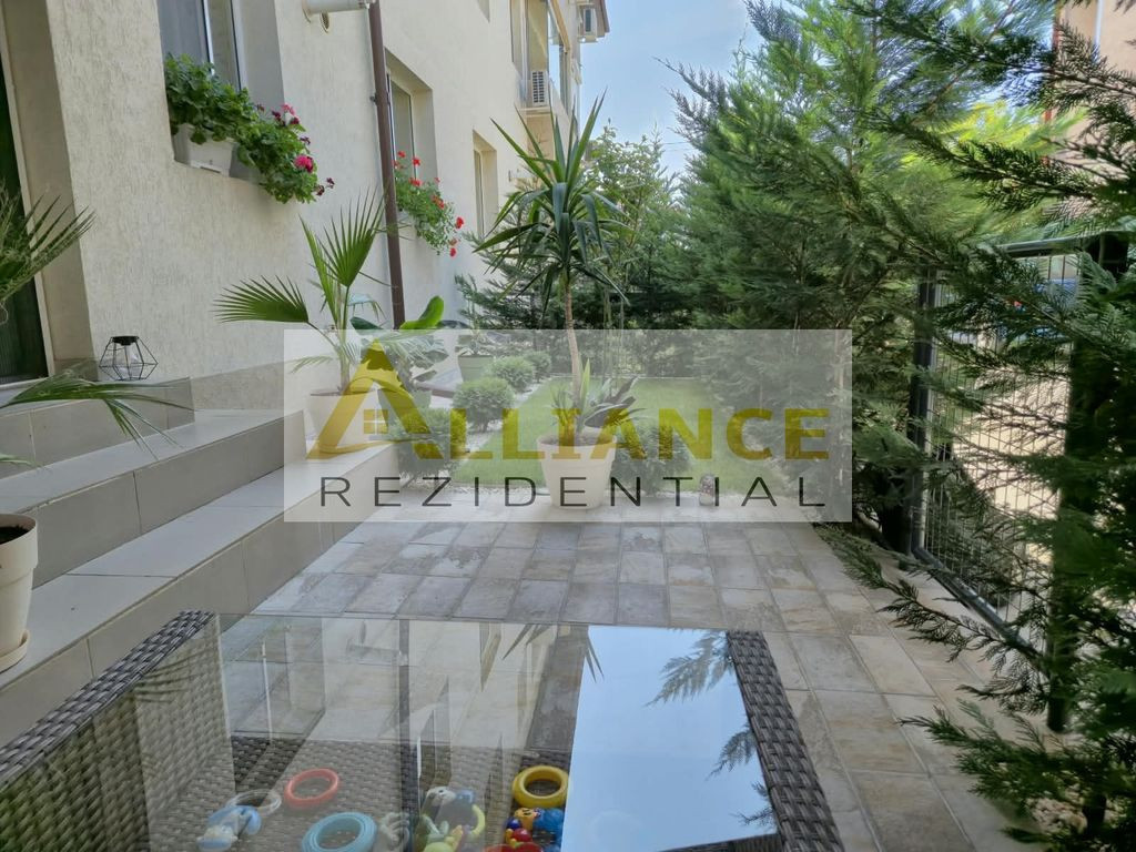 Apartament cu gradina mobilat cu parcare