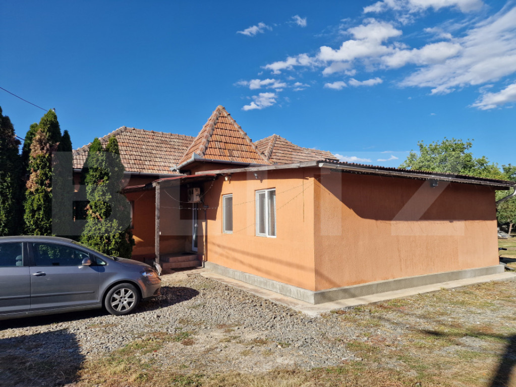 Casa 3 camere cu gradina in suprafata de 1140 mp in loc Rasc