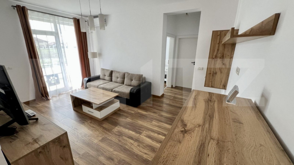 Apartament modern cu grădină proprie de 140 mp și parcare