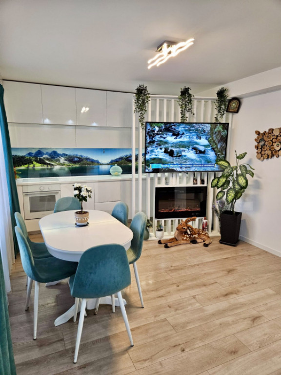 Apartament modern cu 3 camere, terasă și curte privată |