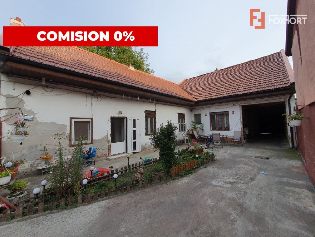 Casa cu 5 camere si service auto, teren 400 mp - zona Calea