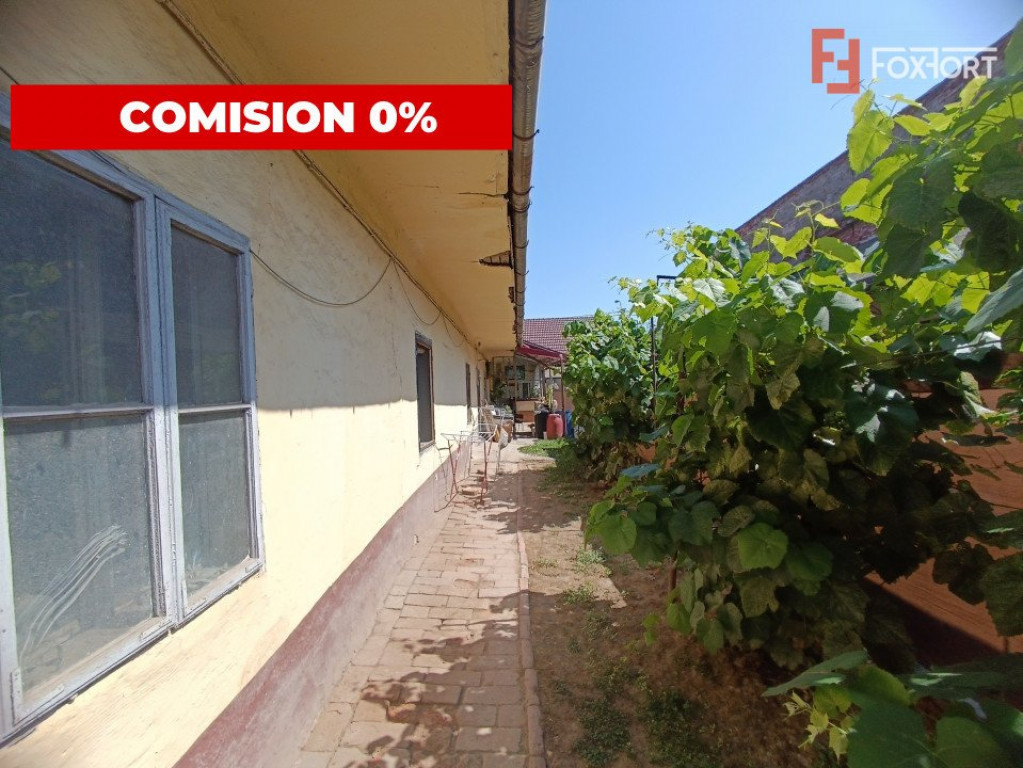 COMISION 0% Casa cu 4 apartamente la curte comuna cu teren t