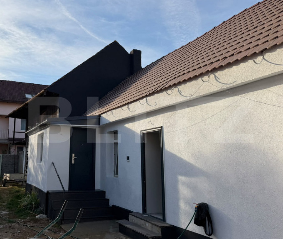 Casă complet renovată de vânzare în Săcele | Se predă