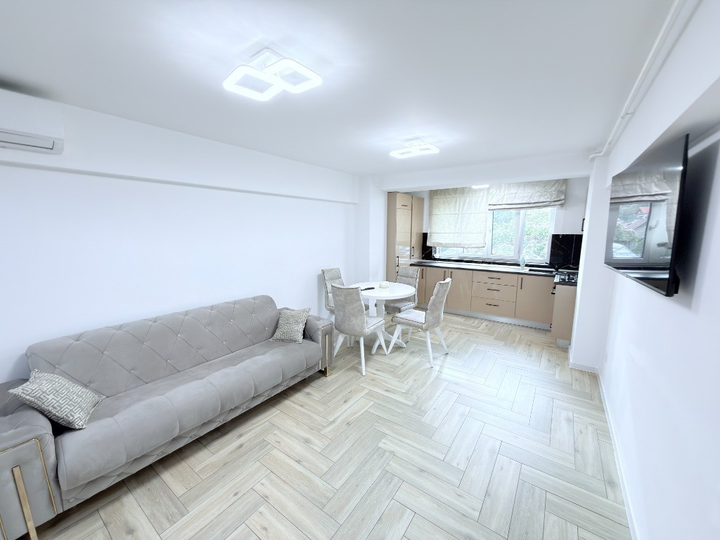 Apartament ultracentral mobilat si utilat cu parcare proprietate