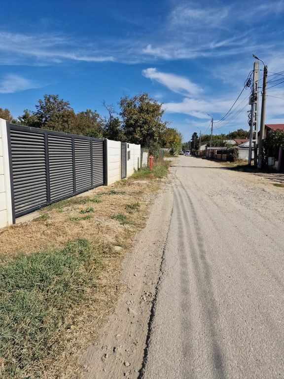 Afumati Strada Iasomiei 1200 mp intre case zona linistita