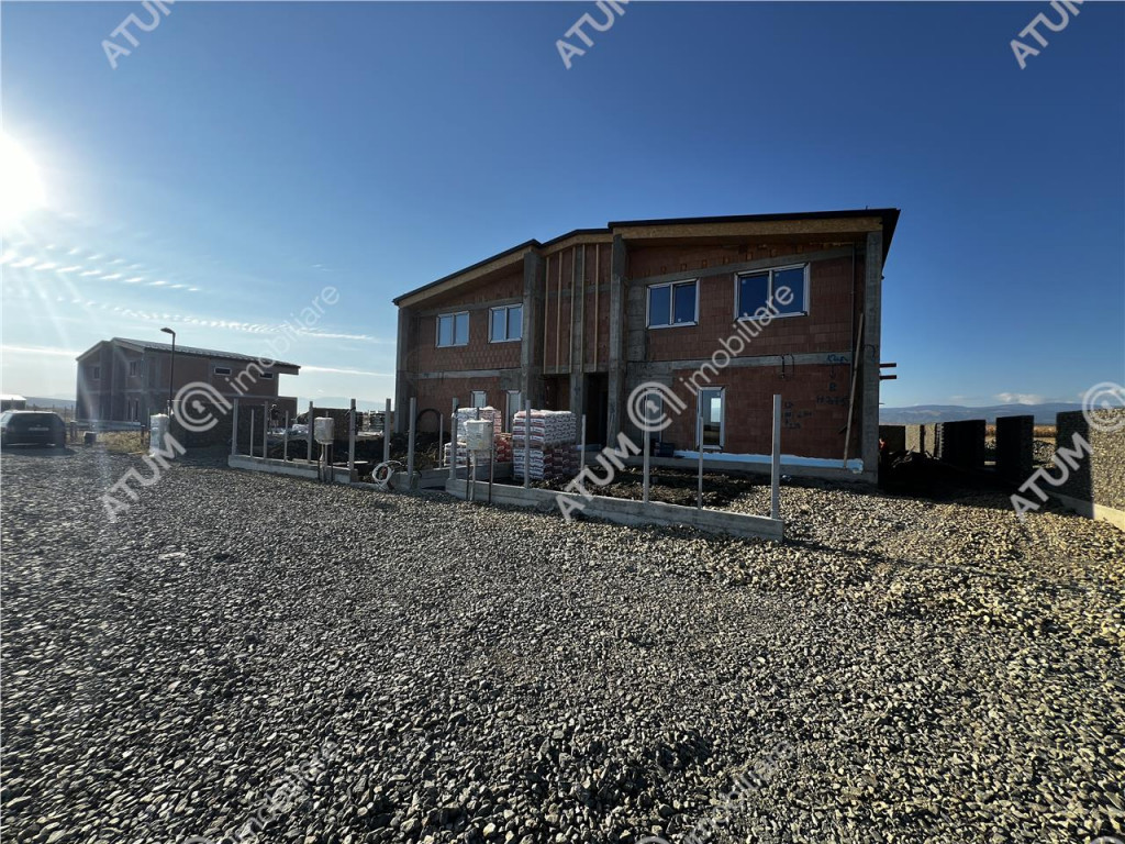 Casa moderna cu 4 camere 3 bai si teren propriu de 350 mp in
