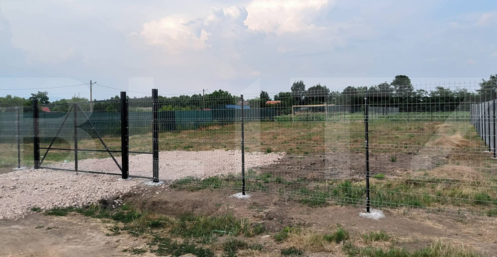 Teren intravilan imprejmuit,945 mp, in Dobolii de Jos
