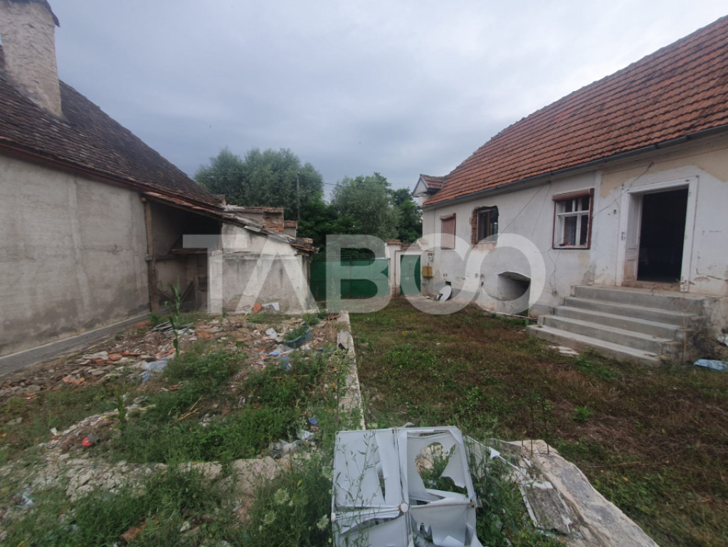 Casa de vanzare in Grid 87 mp utili + anexe beci si sura