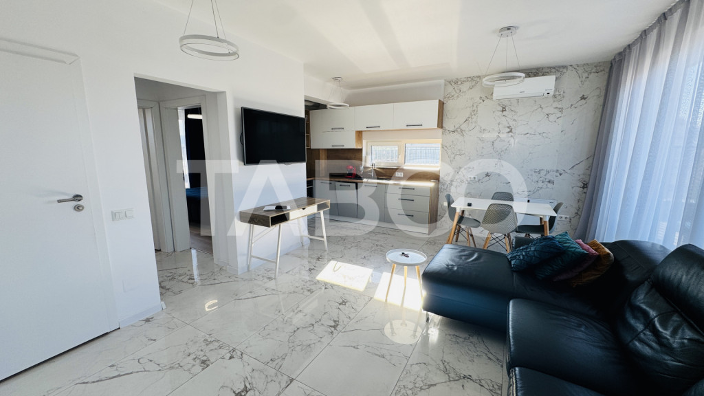 Penthouse cu terasa de 51mp de vanzare 3 camere 2 bai 1 par
