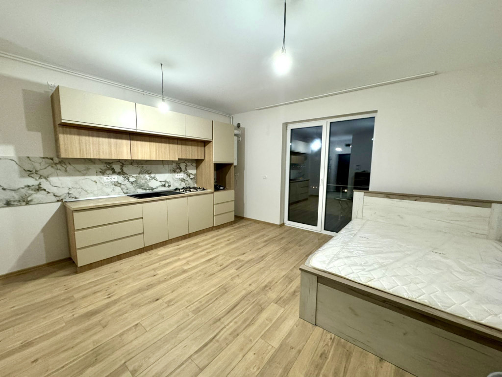Apartament o camera, 30.5 mp utili, balcon, parcare inclusa