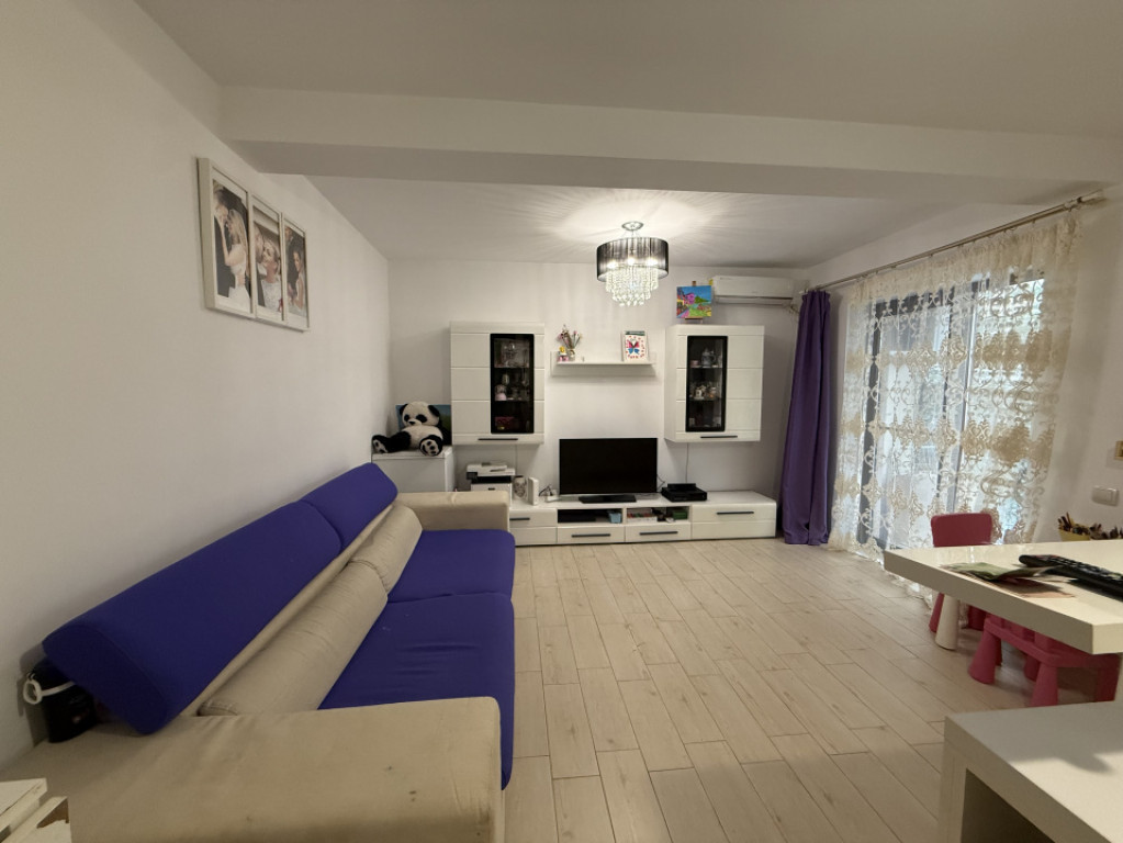 Apartament 2 camere, 52 mp utili + gradina proprie 40 mp - D
