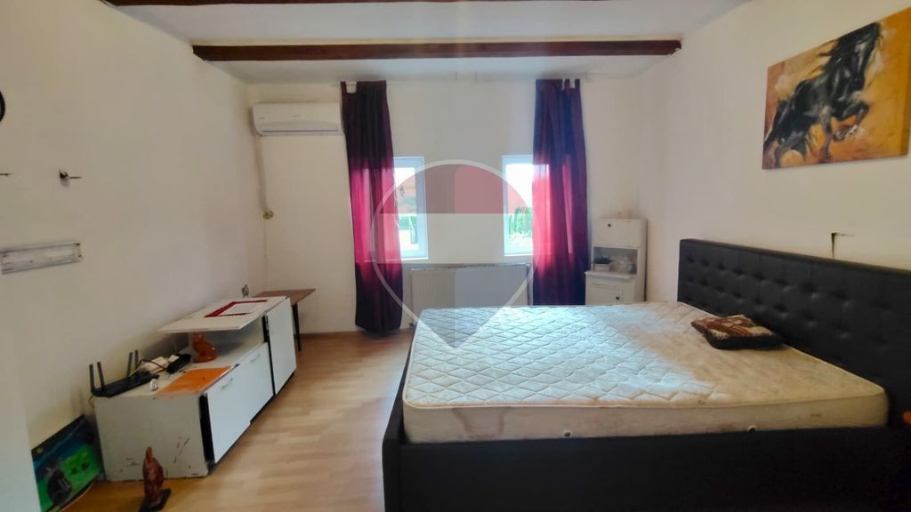 CASA CU GRADINA DE 1.498 MP | 3 FRONTURI STRADALE | SCHEII BRASOVULUI