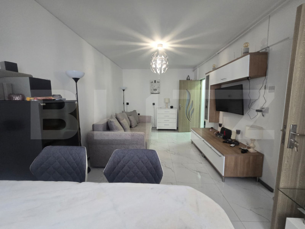 Garsoniera moderna 25 mp, renovata si mobilata complet, etaj