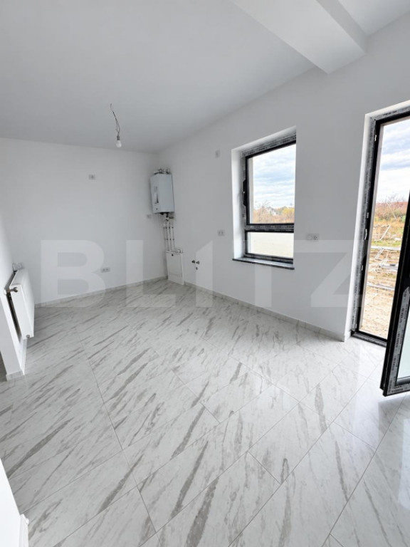 Garsonieră de 55 mp, construcție nouă, cu parcare proprie
