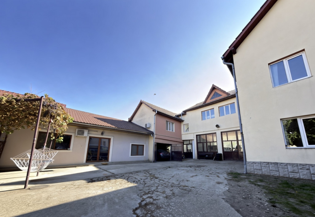 Casa individuala P+E+M cu 7 camere, garaj 140mp, 1084mp tere