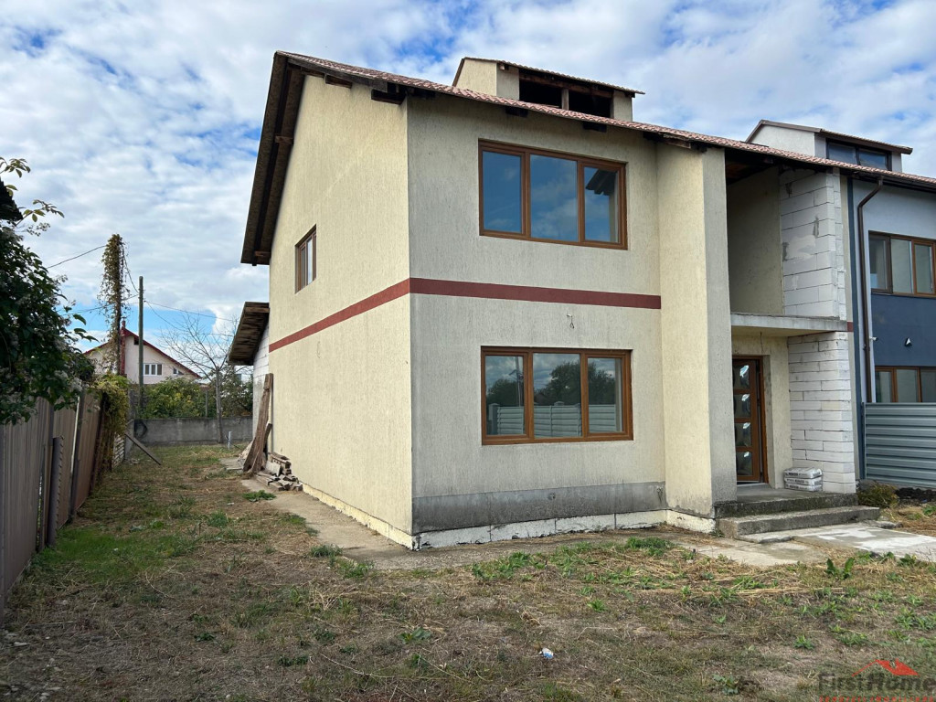 Casa P M de in sat. Garoafa